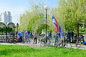 Participants of mass spring bike ride, dedicated to opening of cycling season 2019, after end of event in recreation area, Gomel