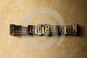 PARTICIPATION - close-up of grungy vintage typeset word on metal backdrop