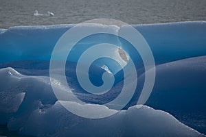 Particular of a blue Iceberg on the Lake Argentino