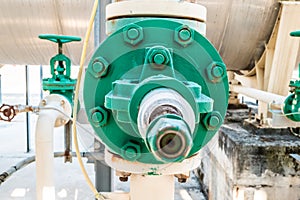 Particularly seen from close up, of a green industrial manual valve photo