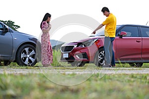 The parties stood on the road while the car accident occurred photo