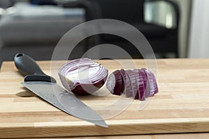 Partly cut red onion