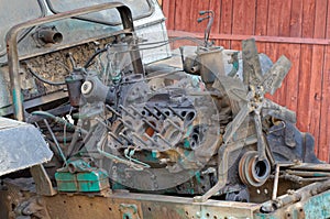 Partly disassembled engine of old tractor