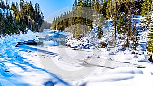 The partly frozen Murtle River after Mushbowl Falls in the Cariboo Mountains of Wells Gray Provincial Park