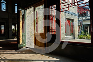 Partly painted door of uncompleted building in sunny winter afternoon