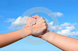 Partner hand between a man and a woman