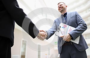 Partners shake hands, beneficial deal, successful agreement, biz partners perform friendly gesture