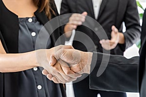 Partnership. business man investor team handshake deal with partner after finishing up business meeting