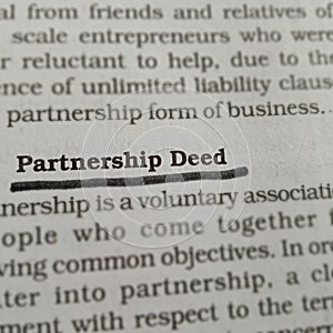 partnership deed business related terminology displayed on script paper