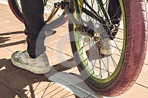 Parts of a bmx bicycle. Boy with a bmx for the city