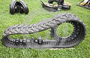 Parts of construction and agriculture machine with rubber crampo