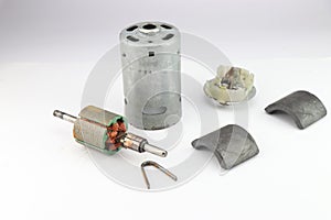 Parts of a dc motor was disassembled to have a look at all the components used inside that help in running