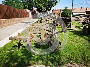 Parts of a large agricultural cultivator
