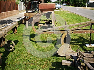 Parts of a large agricultural cultivator