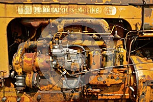 Parts of an old Minneapolis Moline tractor engine