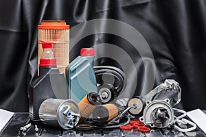 Parts for scheduled car maintenance.Oil , air , fuel filter, Water pumps motor, belt car engine   for car  - Image