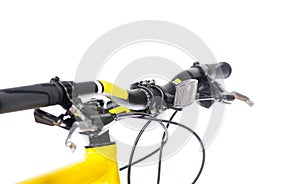 Parts of yellow bicycle on a studio white background. Close up details