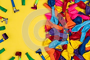 Party accessories on yellow background, flat lay