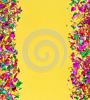 Party background Colorful confetti decoration yellow paper texture