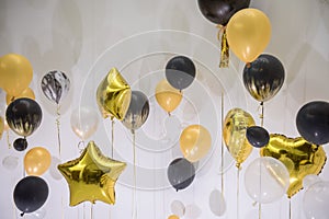 Party balloons celebration background golden texture