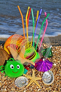 Party decorations on the beach. Starfish, shells, candies.