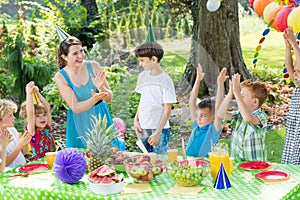 Party entertainer playing with kids