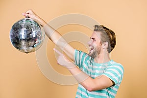 Party fun. man with disco ball. happy party-goer. party time. birthday celebration. christmas or new year holiday. man