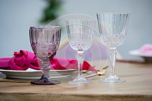 Party in the garden. flowers, glasses and Balloons Arrangement. Festive table setting. Party with a special theme.