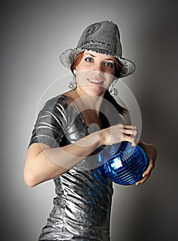 Party girl with blue disco ball