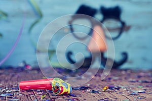 Party horns, confetti and fake glasses, nose and mustache