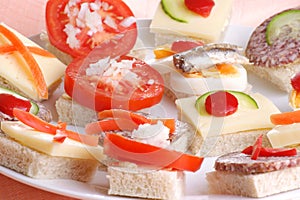 party nibbles on a white plate