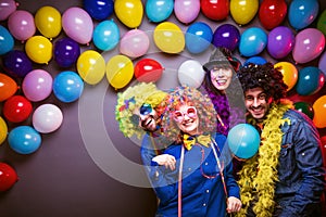 Party People celebrating carnival or New Year in party club