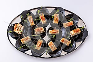 Party platter of bite size appetisers. Appetizer canape. Catering