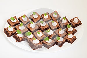 Party platter with small chocolate cakes