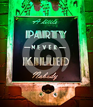 Party sign. A little party never killed nobody (sic) anybody.