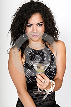 Party time female holding a martini cocktail