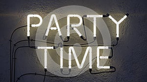 Party time neon sign on concrete wall