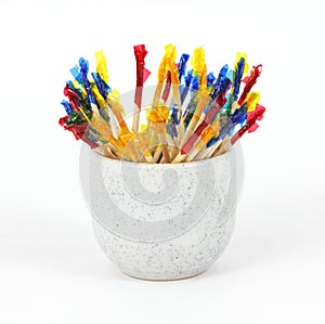 Party toothpicks in small cup