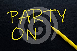 Party On Yellow Pen with yellow text own rent at the black background