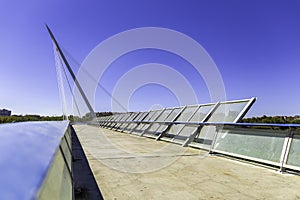 Pasarela del voluntariado. Modern bridge crossing the river Ebro in Zaragoza. Modern architecture photo