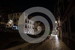 Paseo de los Tristes in Granada, Spain at Night photo