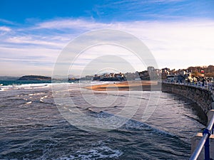 Paseo maritimo de Santander y la playa del Sardinero con el mar Cantabrico de fondo photo