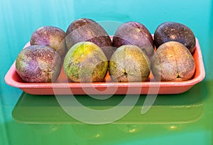 Pasiflora fruits on plastic tray