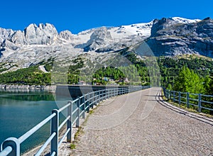 The Pass Fedaia 2054 m is denominated by the Fedaia Lake, a nuge 2 Km long , on the foot of the Marmolada glacier, the que