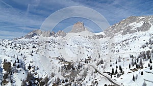 Pass road in the alps, aerial of passo giau and monte averau in the background