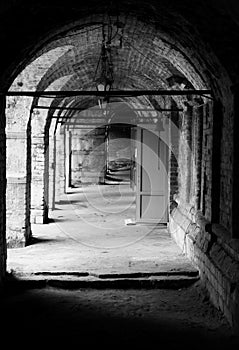 Passage with brick walls and doors