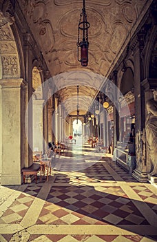 Passage with cafes and restaurants at San Marco square in Venice