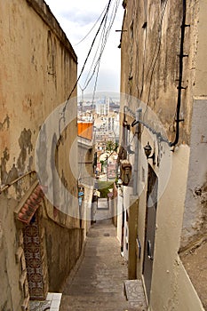 Passage between houses, narrow street, Algiers city, view of the ship docks, Algiers, Algeria, Africa