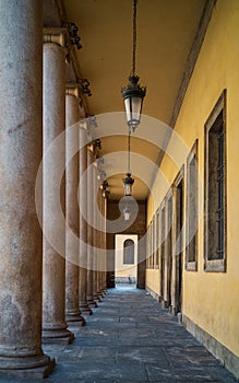Passage inside columns of Teatro Regio theater in Parma. photo
