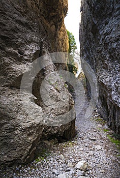 The passage between the rocks in the canyon crevice